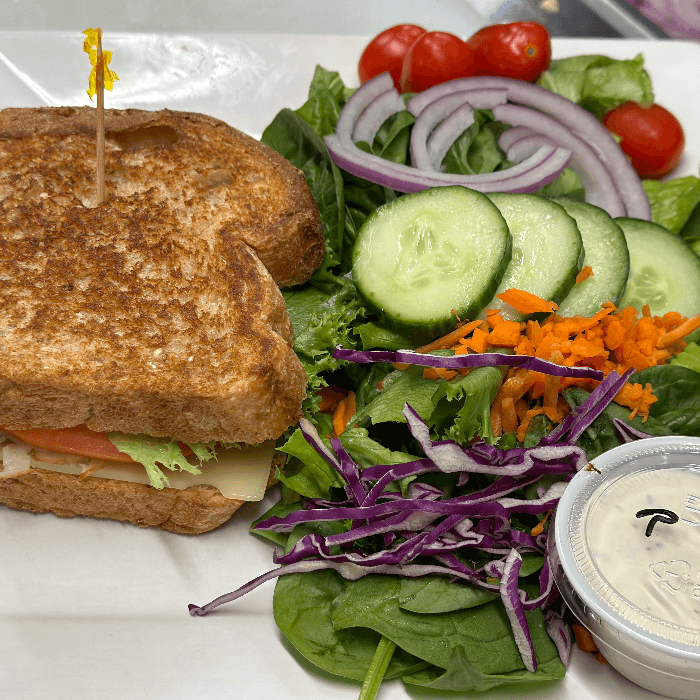 1/2 Sandwich & 1/2 Mixed Green Salad