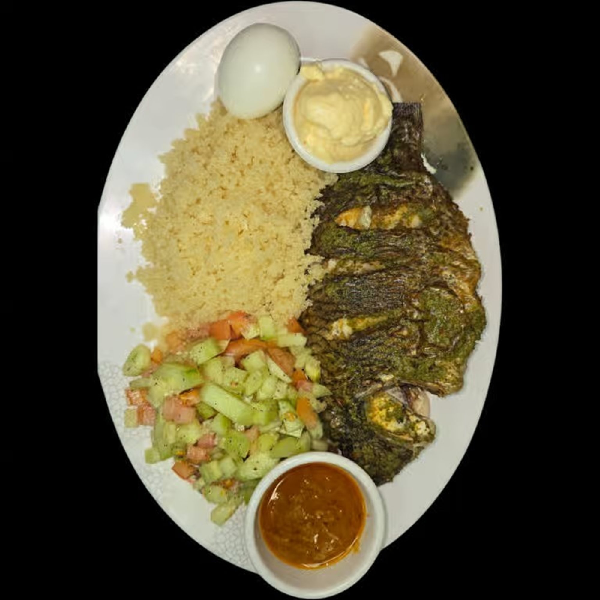Attieke with Grilled Tilapia, Mixed Vegetables With Sauce