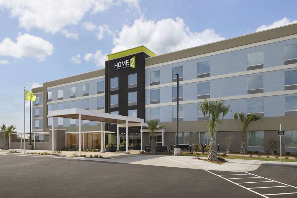 Home2 Suites by Hilton San Juan Logo