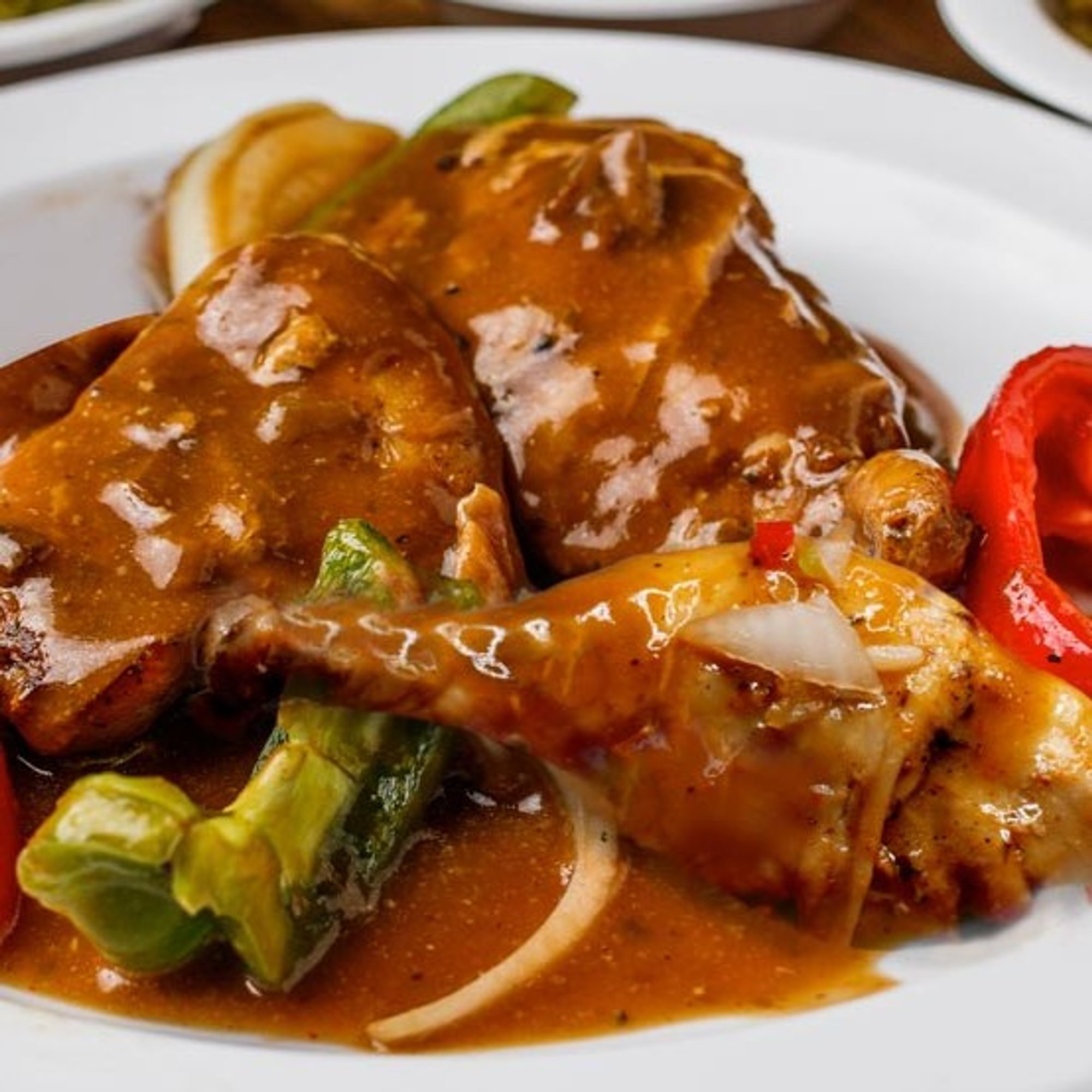 Smothered Chicken with Two Sides
