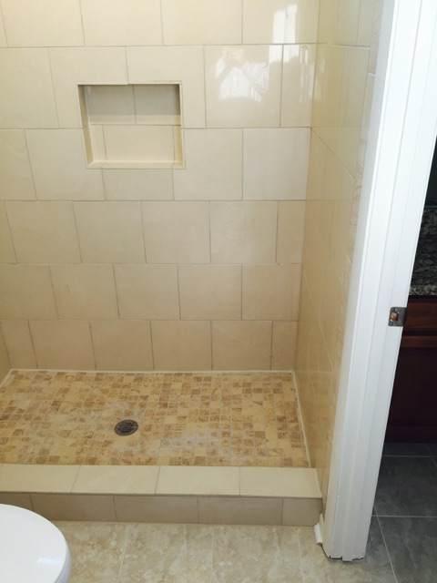 There was a tub insert our customer no longer wanted, and we replaced with full size stand up shower. 