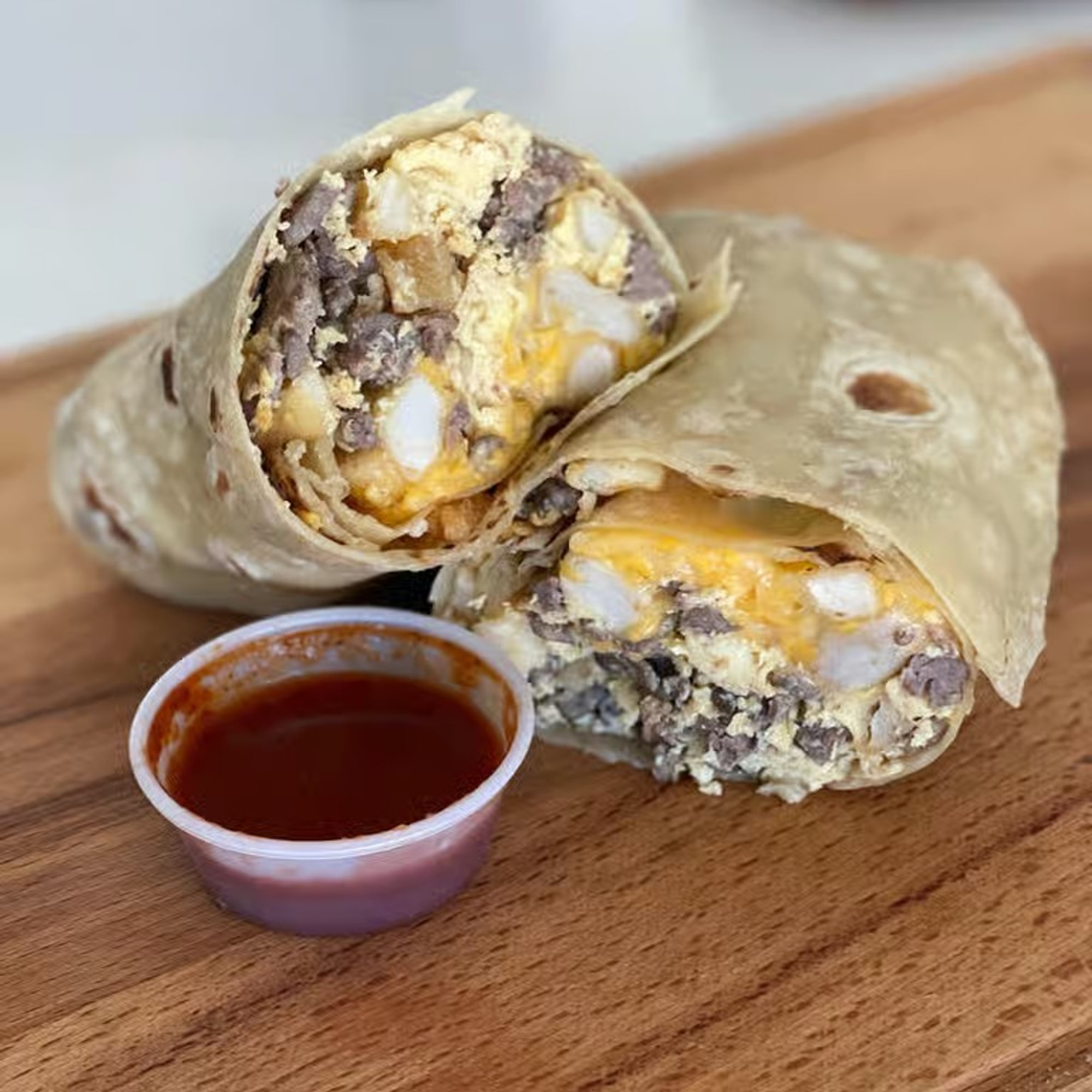 Asada, Eggs, Potatoes & Cheese Burrito