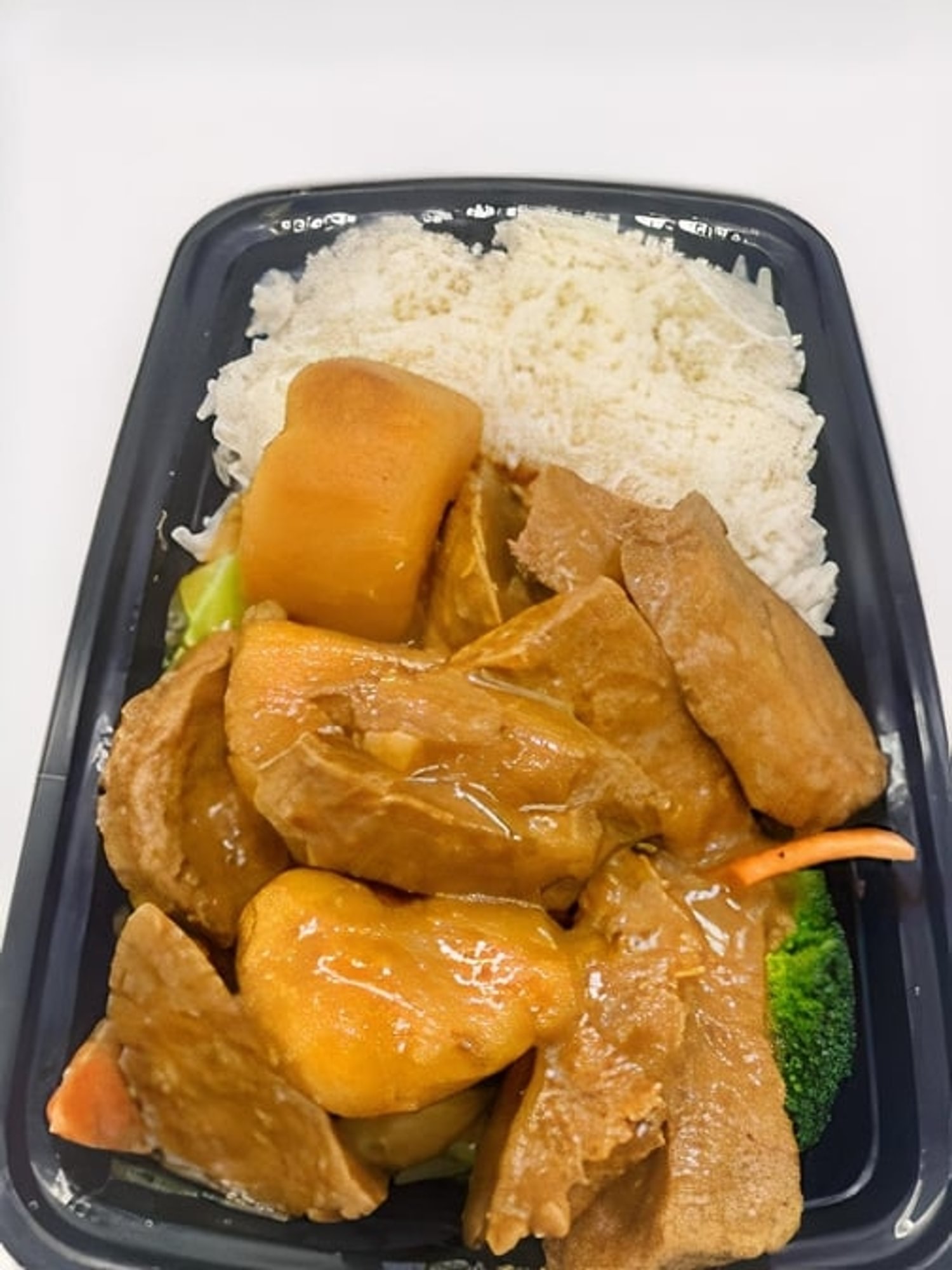 Curry chicken cooked in coconut milk lunch special