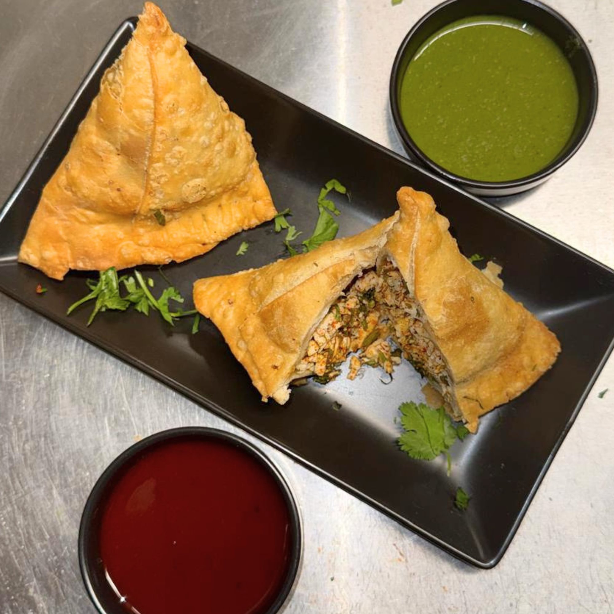 Paneer Pocket Samosa™ — Crispy Outside. Cheesy Desi Inside.
