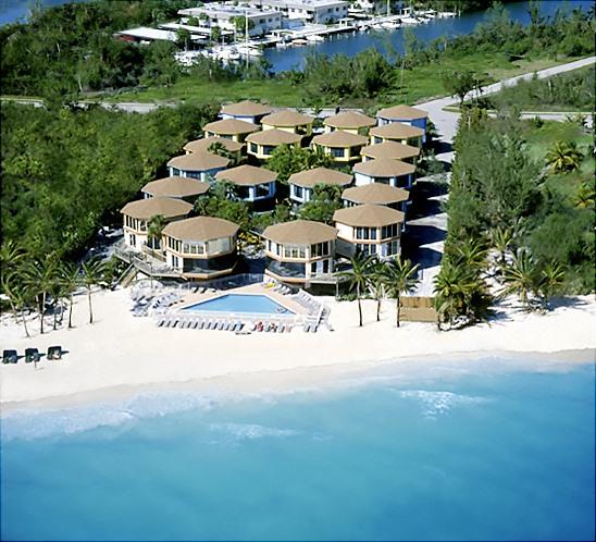 Topsider early-era Florida Keys beach resort. Each villa is elevated with two living levels and an enclosed screened lanai. These homes, built facing the Atlantic, were designed to be hurricane resistant