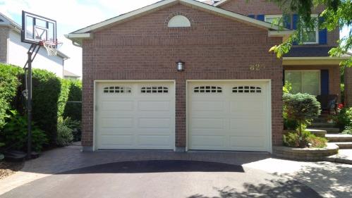 Dano's Garage Door Service Logo