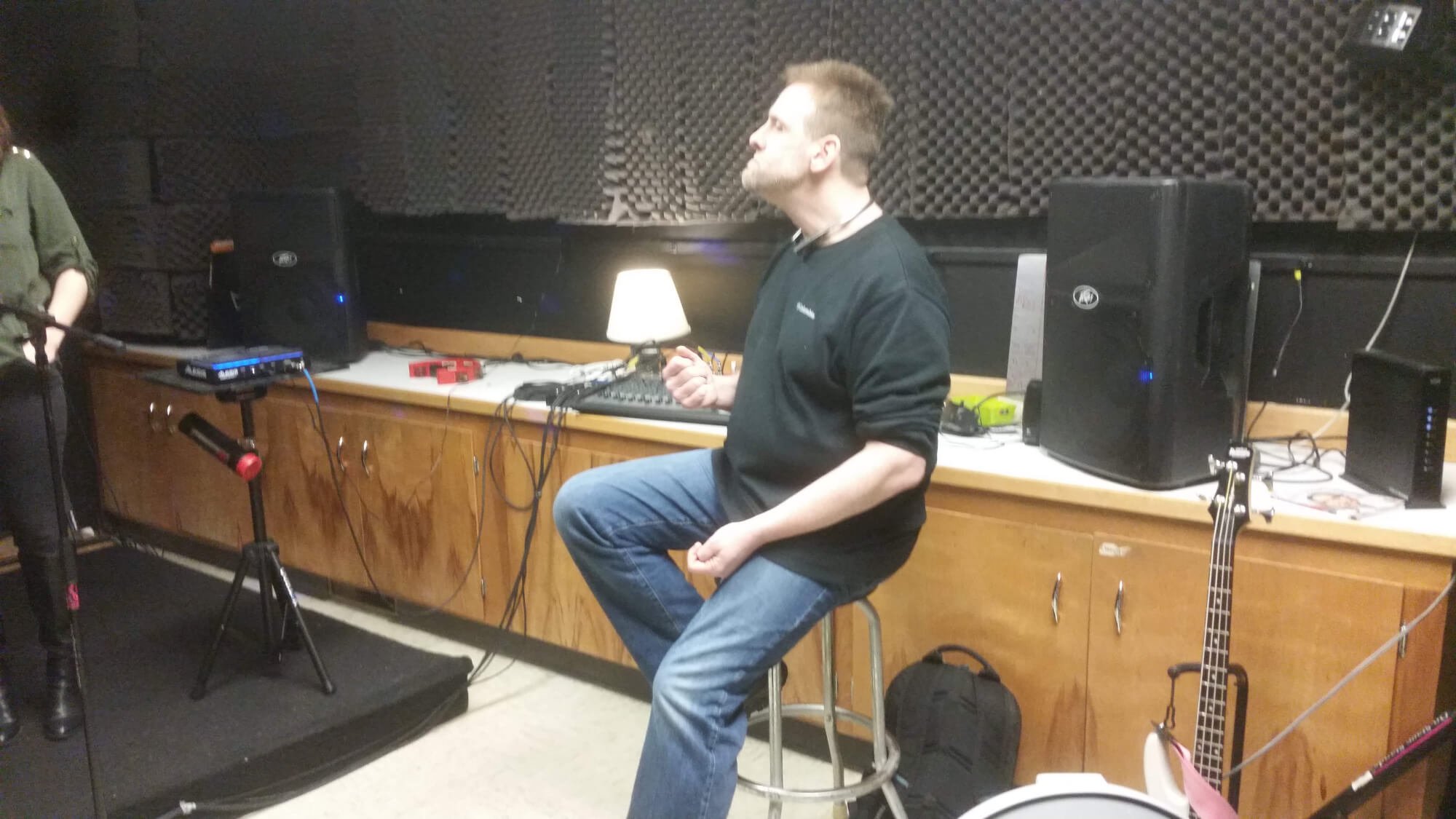 One of our teachers listens to rehearsals.