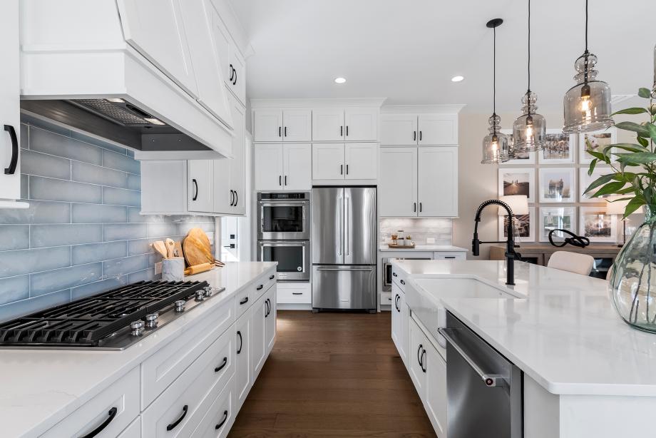 Well-designed gourmet kitchen of the Hillside is complete with a large center island