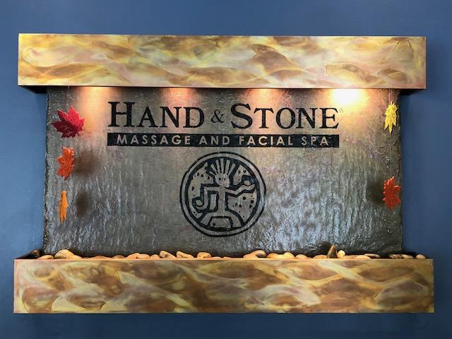 Hand and Stone Massage and Facial Spa Logo