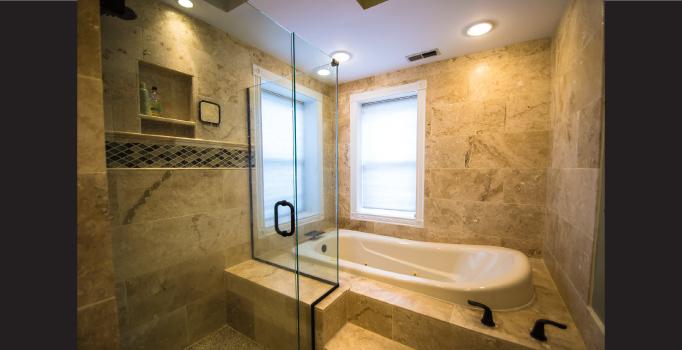 Floor to ceiling travertine tile surround