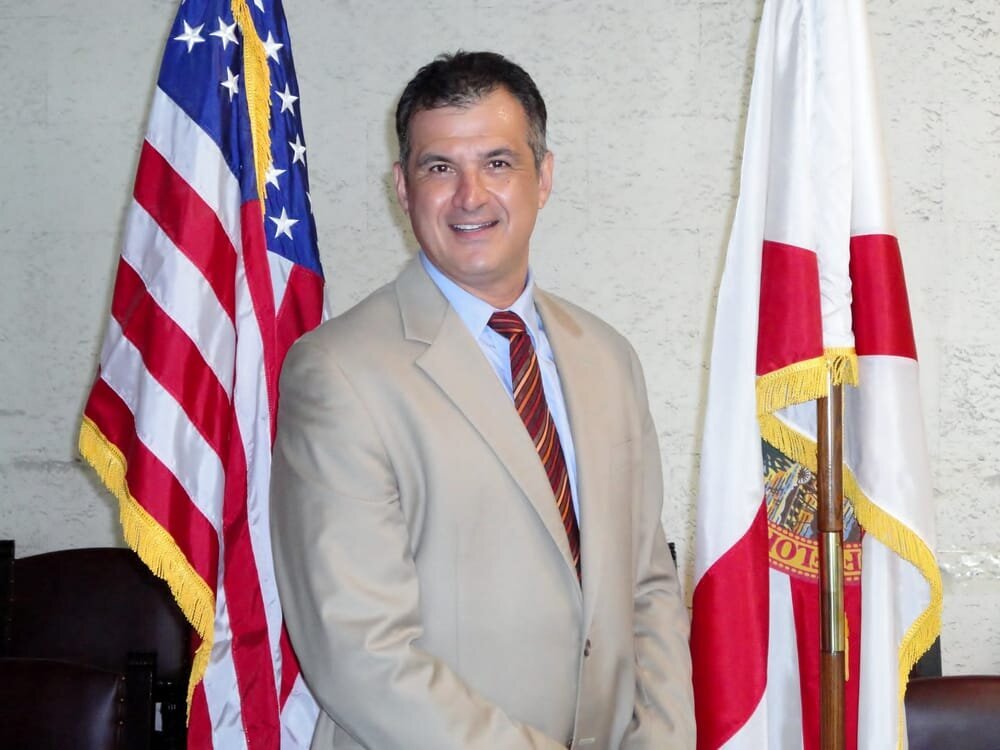 The Law Offices of Daniel E. Tropp, Esq. Logo