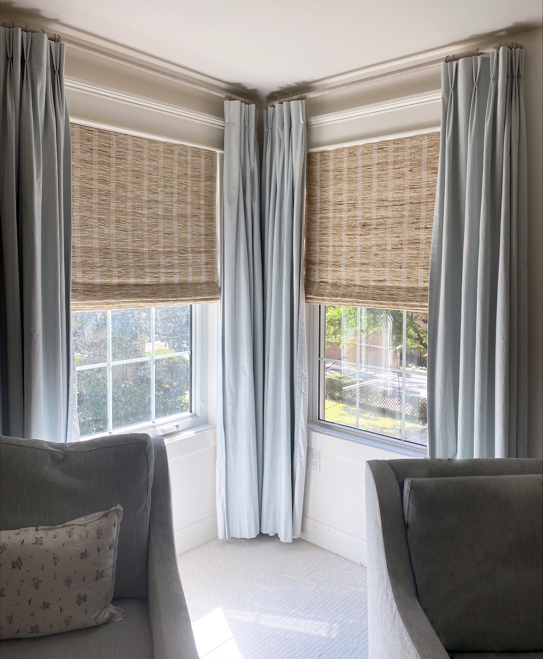 Woven wood shades and custom draperies