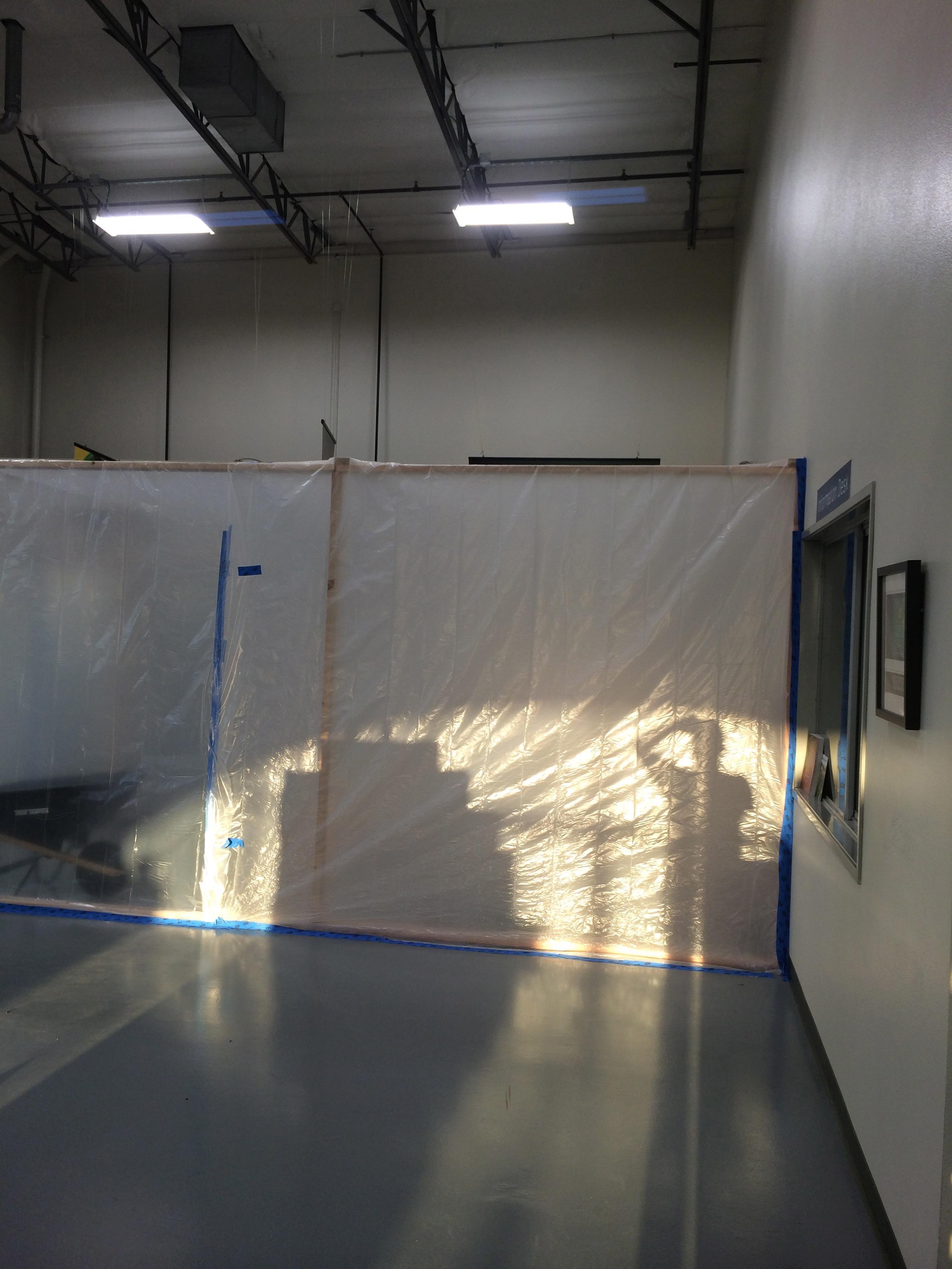Created a capsule  around the job to prevent the dust, debris, and dirt to spread throughout the show room in the John Deere business. 