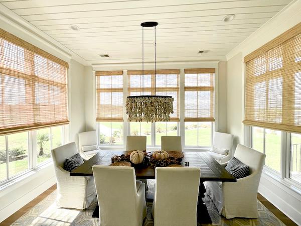 Optimize your space by adding woven wood shades! Notice how these shades add a fun twist and add a whole new appearance to this stunning Bluffton dining room. Don't wait- let us help transform your space and schedule a free in-home consultation with us today!