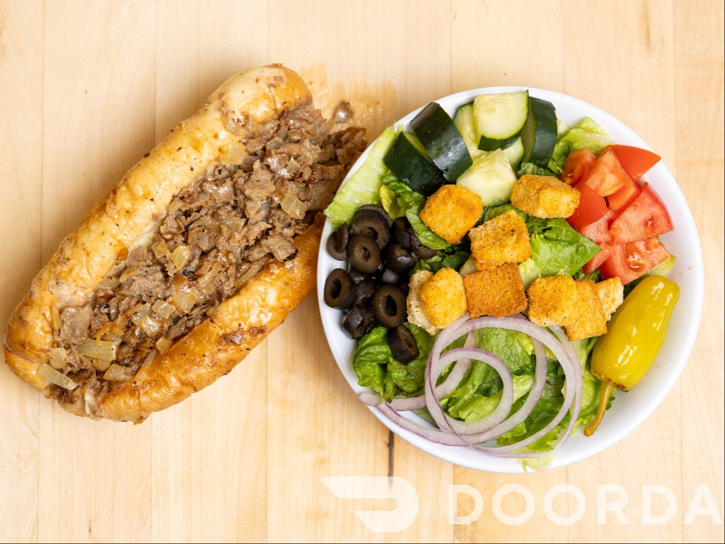$12 Famous Philly Cheesesteak W/Salad