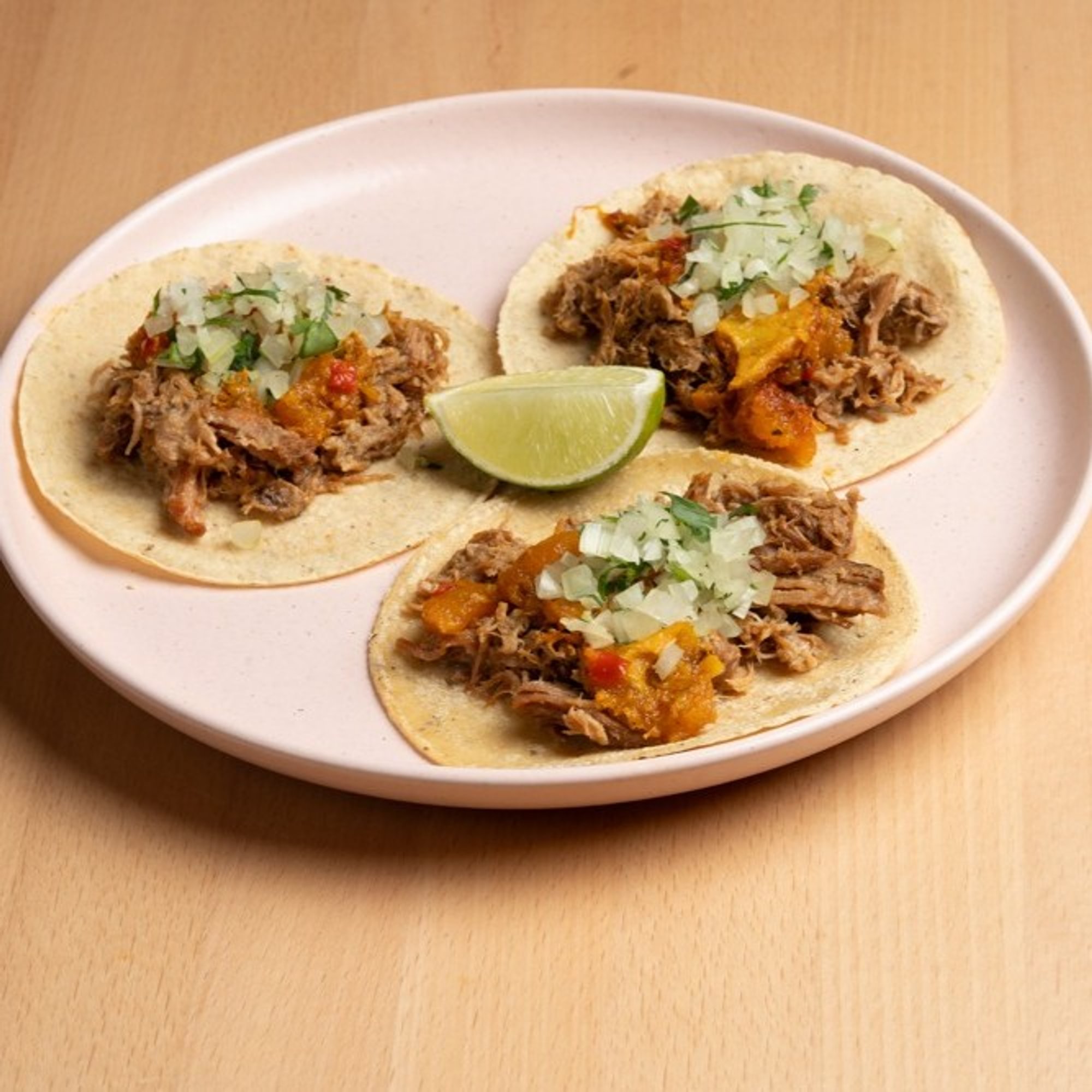 Tacos de Carnitas de Cerdo