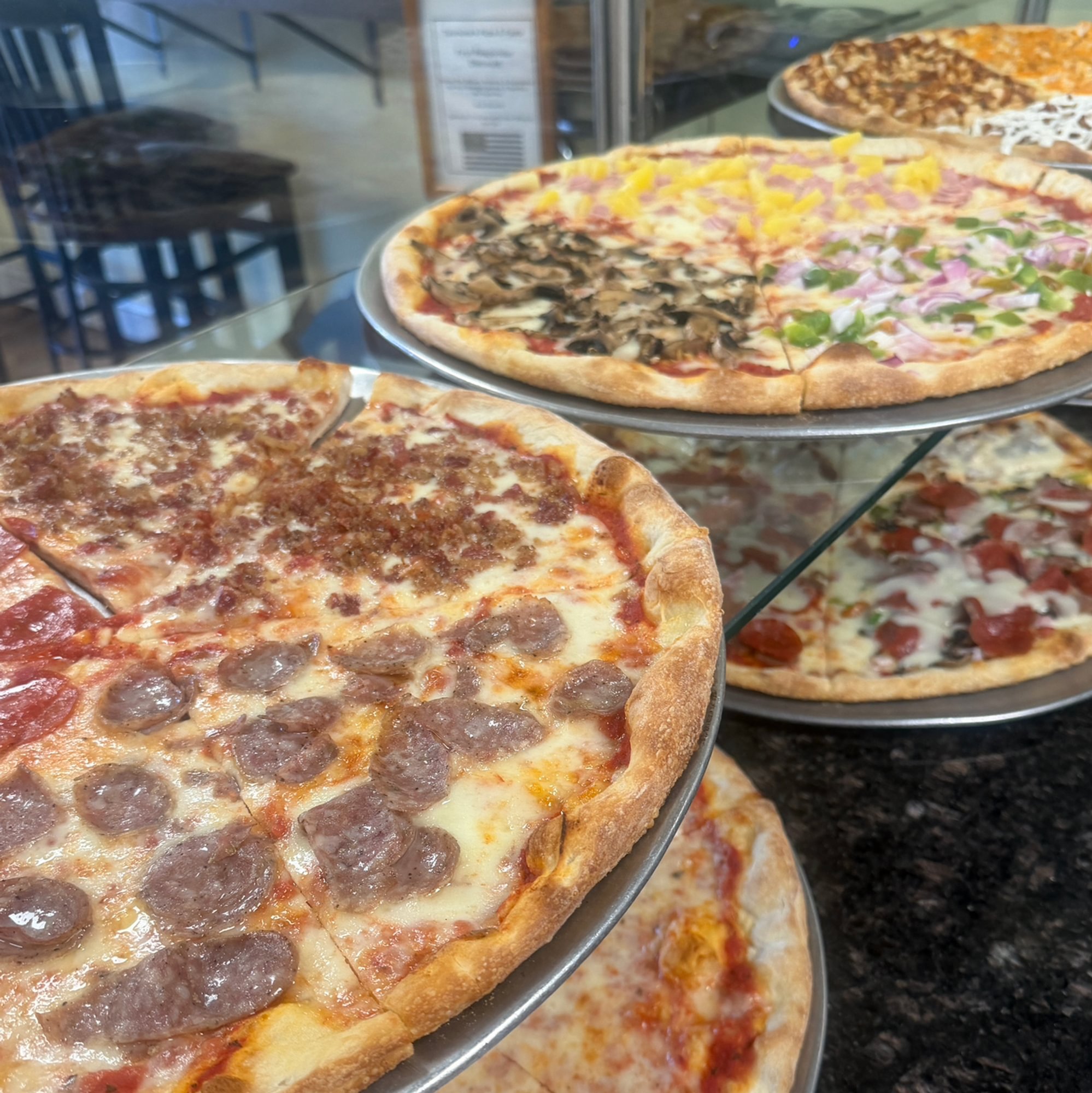 Buy Two Large Pizzas, Get a Free 2-Liter Soda