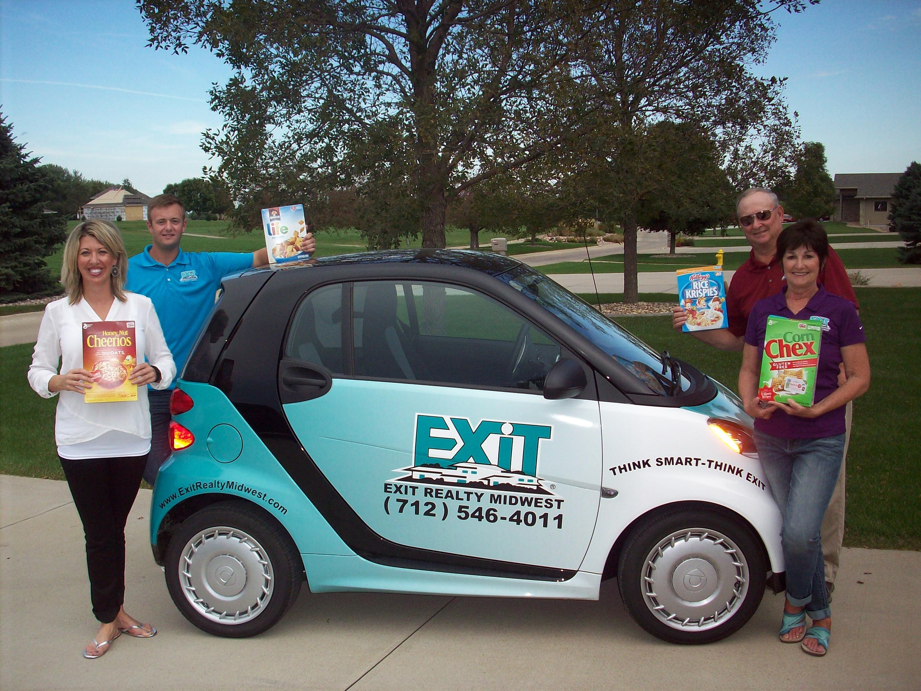 Help us fill our EXIT Smart Car for the Back Pack Program of Le Mars. The agents at EXIT Realty Midwest (Misty Szczech, Austin Sitzmann, Dave Klohs and Jan Wagner) in Le Mars will be taking donations on Thursday evening (Sept. 17). We will be parked in the Fareway parking lot from 4-6:30 pm. Stop by and drop a box of cereal in our Smart Car and fill it up for the Le Mars Back Pack Program.