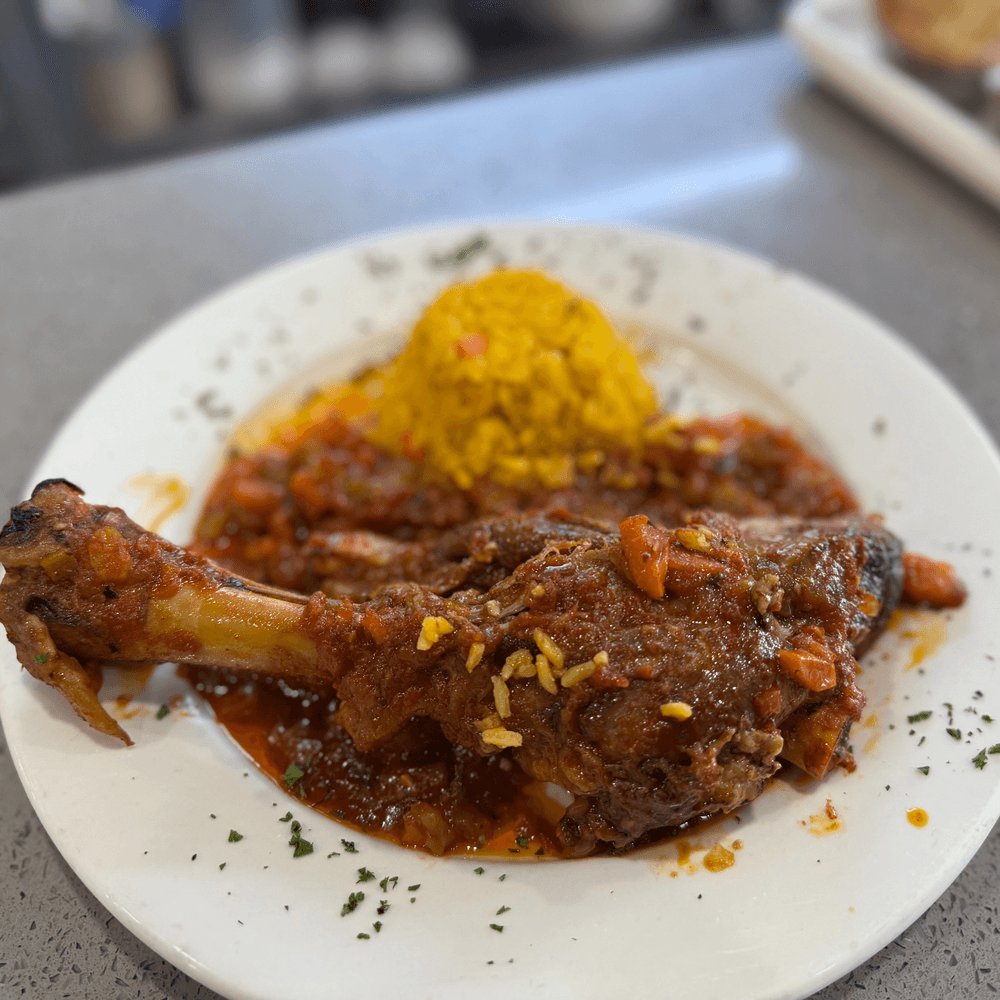 Lamb Shank Over Rice