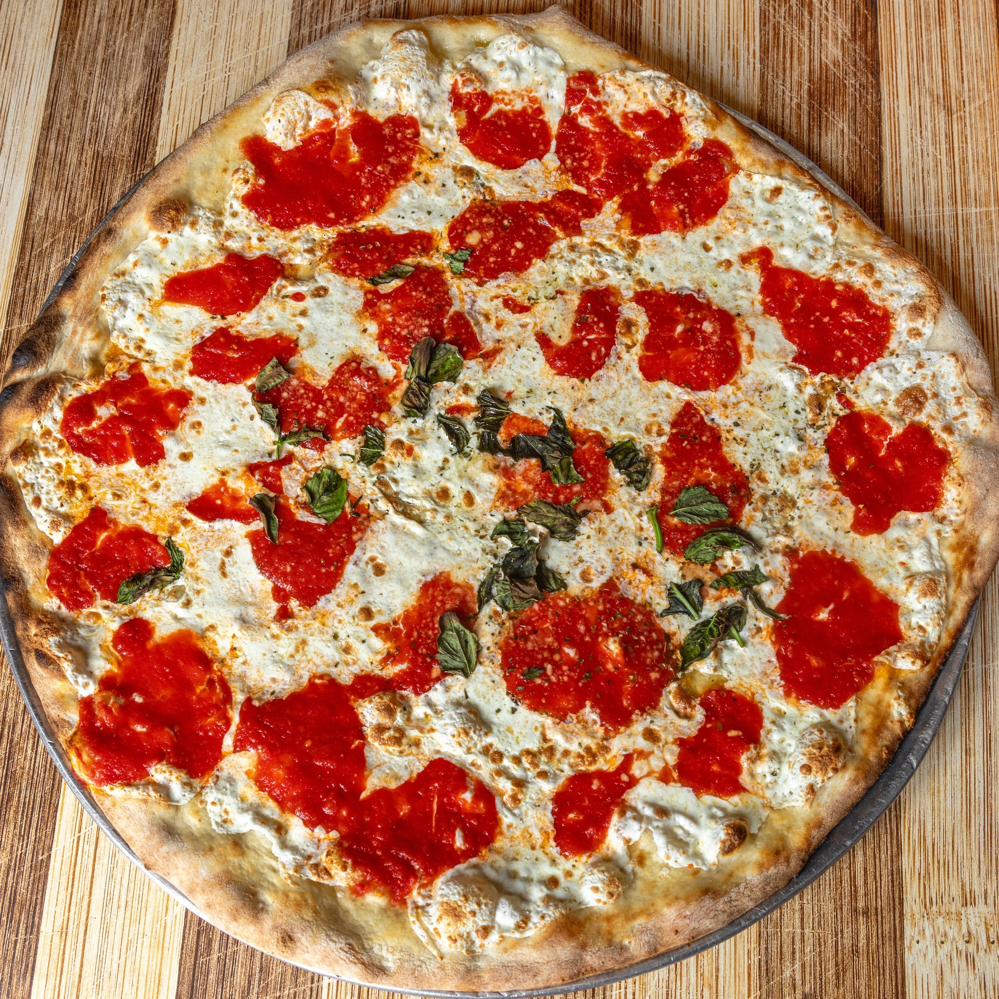 Homemade Fresh Mozzarella, Crushed Tomato & Basil Pizza
