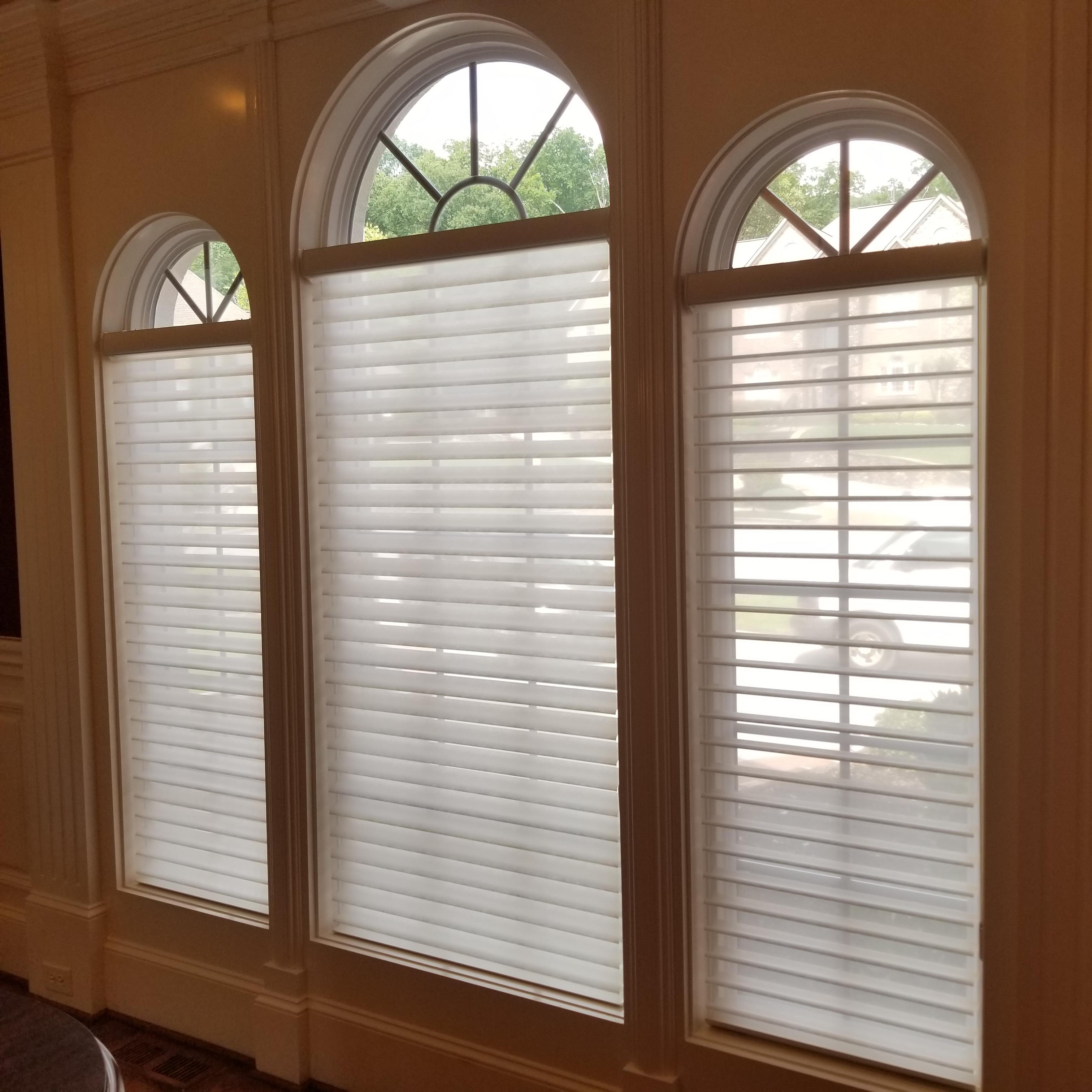 Beautiful windows but now dressed with Window Shadings for privacy, light control and elegance!