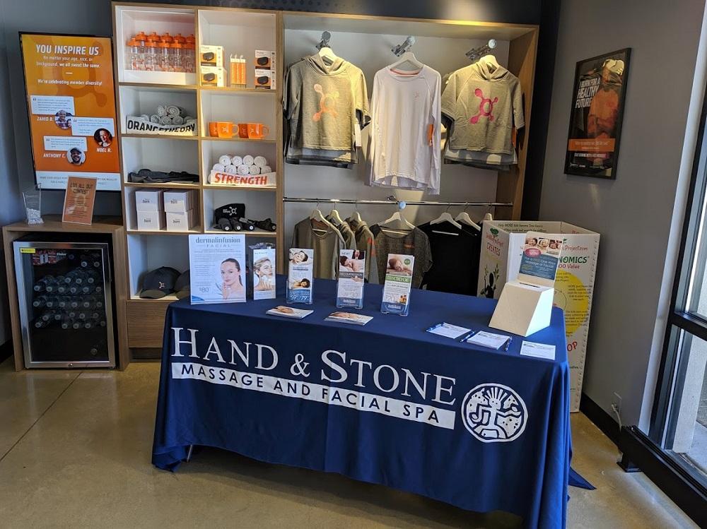 Hand and Stone Massage and Facial Spa Logo