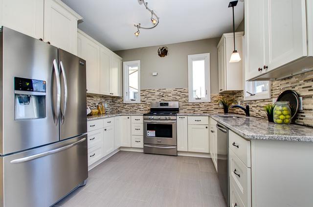 This is the kitchen after the renovation. We can help set you up with designers and contractors to create your custom kitchen