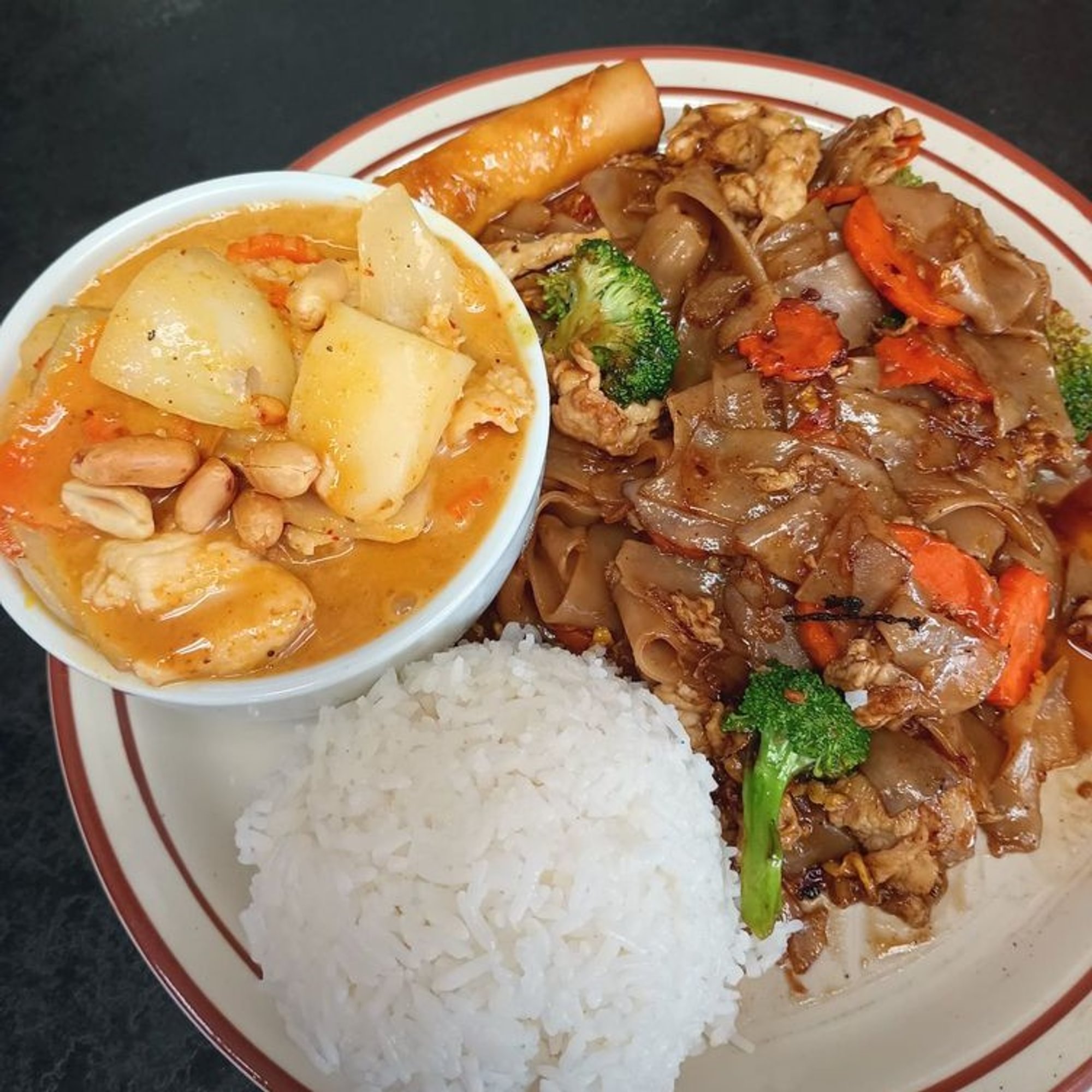 13. Chicken Pad Se-ew and Chicken Massaman Curry