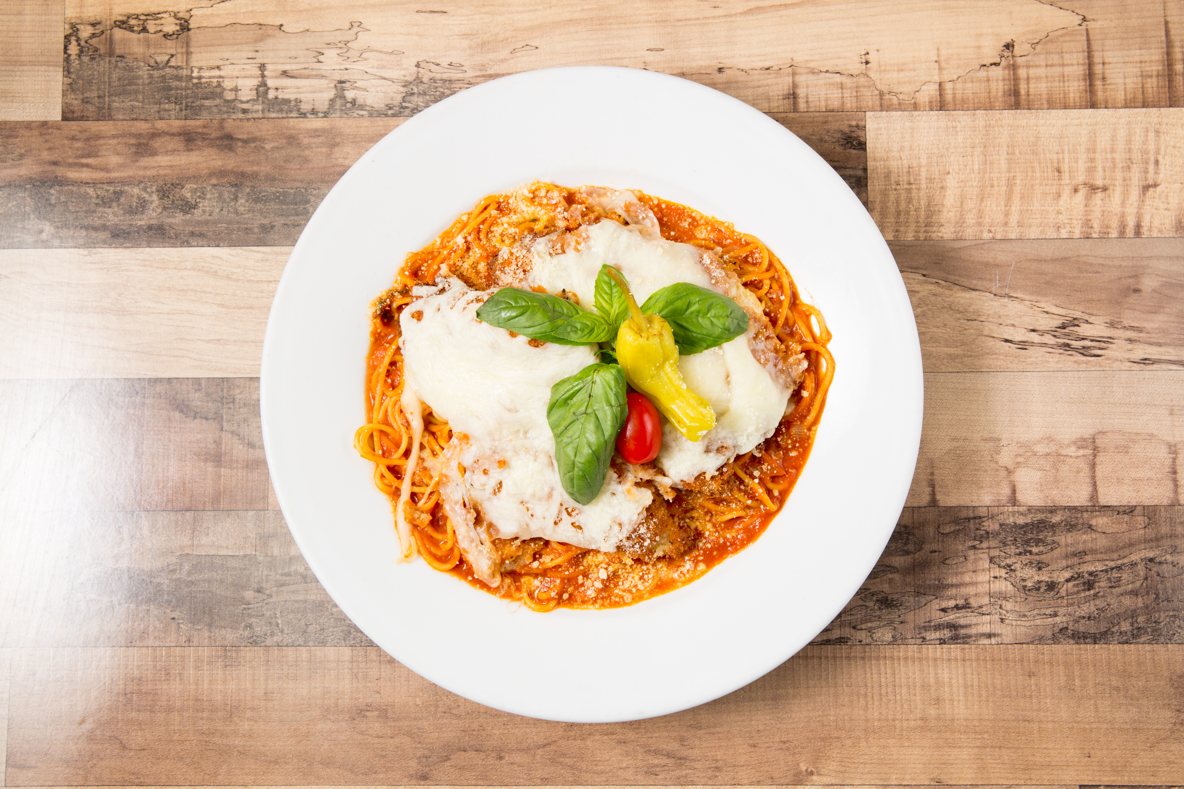 Chicken Parmesan over Spaghetti