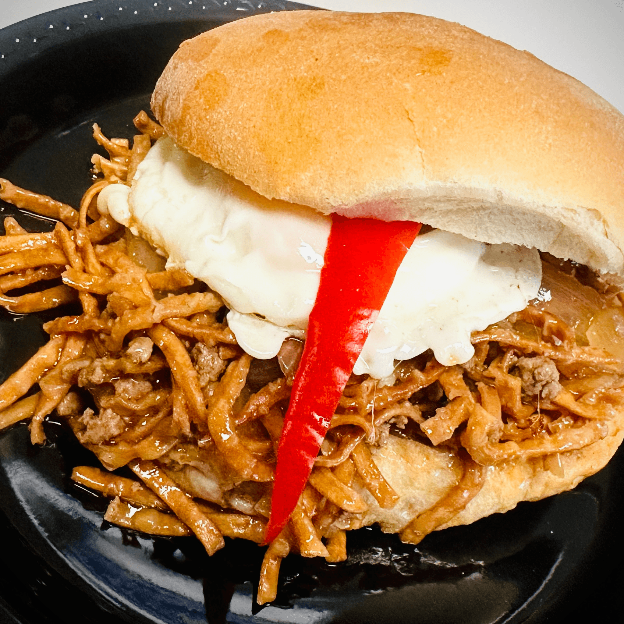 Portuguese steak chow mein sandwich