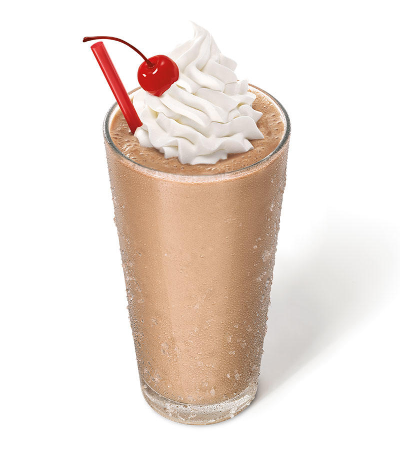 Hand-mixed, Real Ice Cream Shakes have a classic look with a rich chocolate flavor, finished with whipped topping and a cherry.