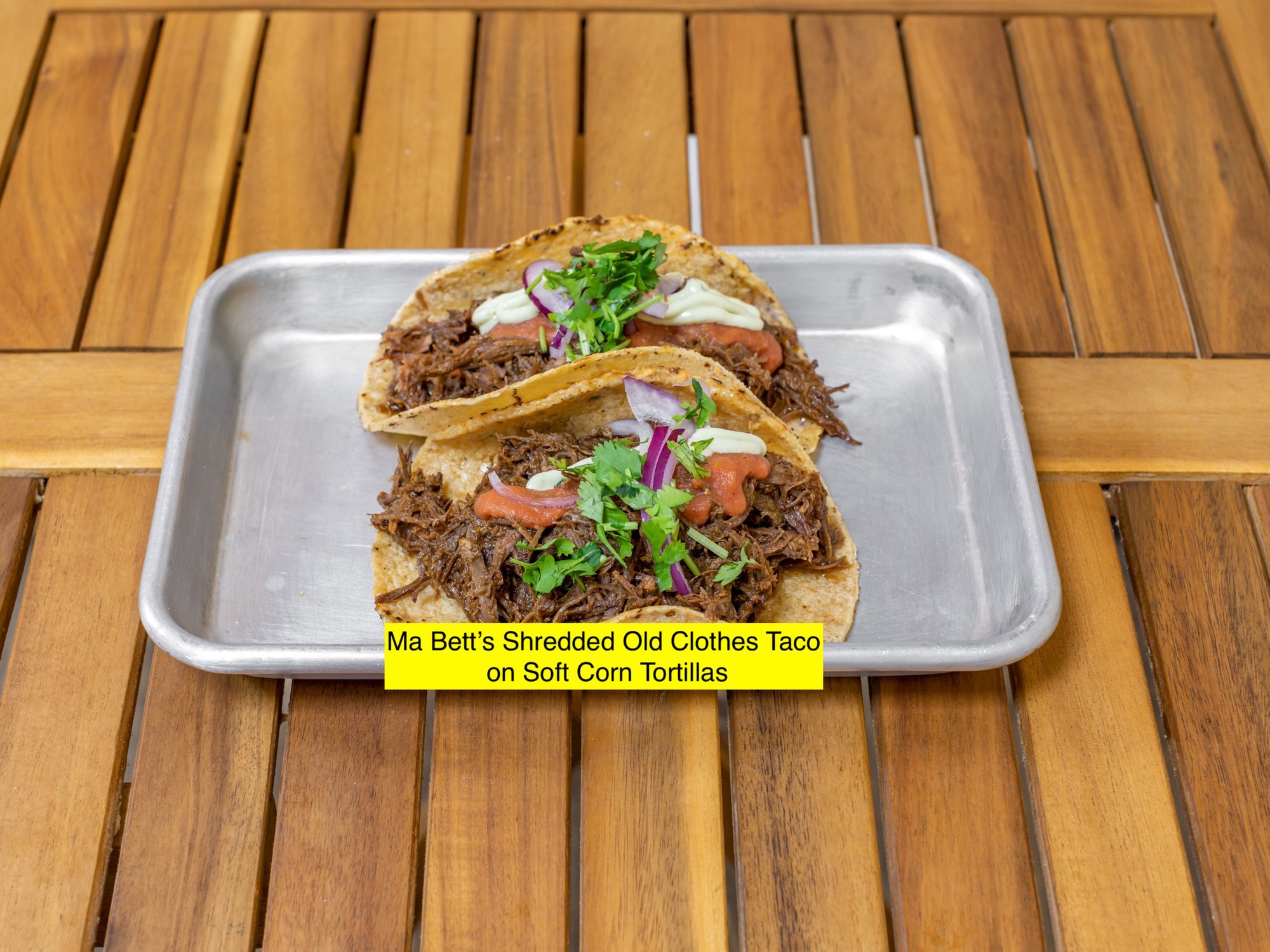 Ma Bett's Ropa Vieja Brisket Tacos, zhug mayo, roasted tomato salsa, pickled red onions, cilantro