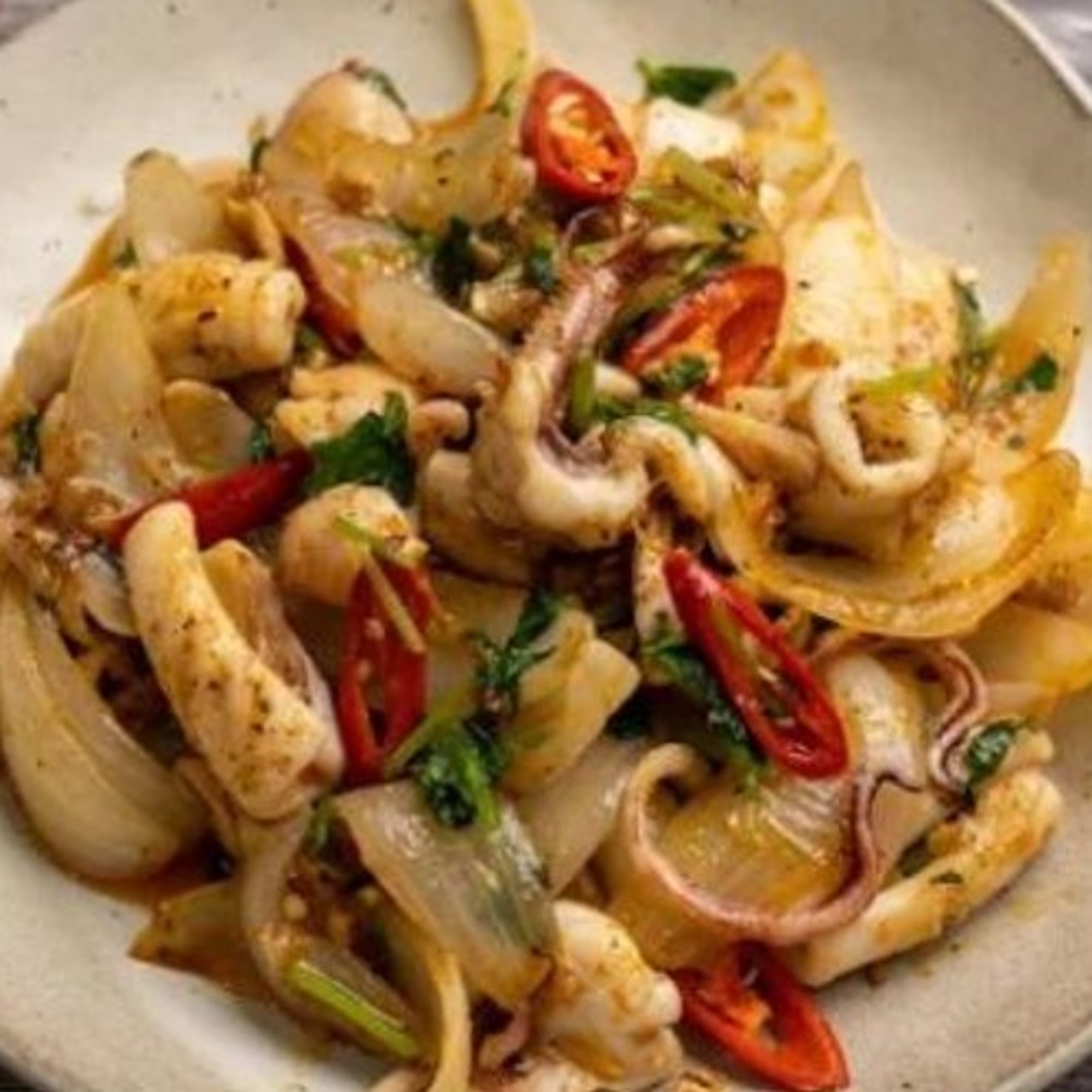 Mực Nang Xao Sate/ Sauteed Squid with Spicy Chili Sauce.
