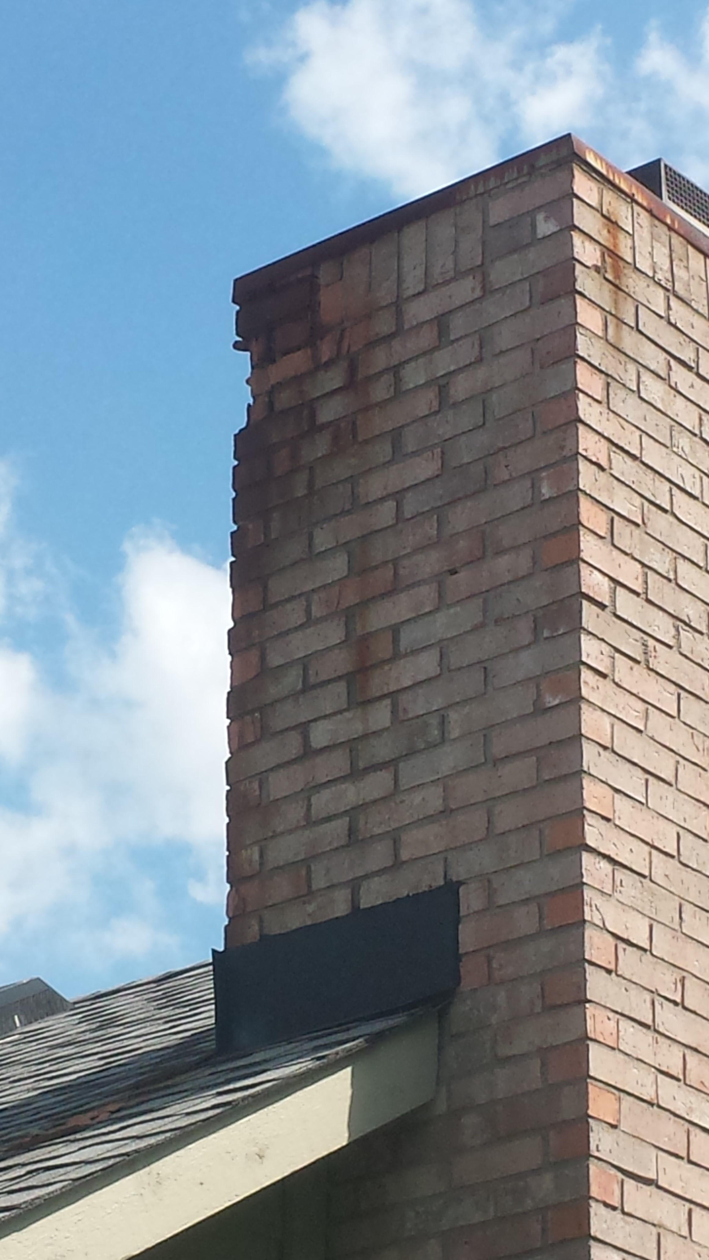 This chimney had a metal cap that began to rust . Also when the cap is flush with the sides of the chimney water ran down and deteriorated the brick