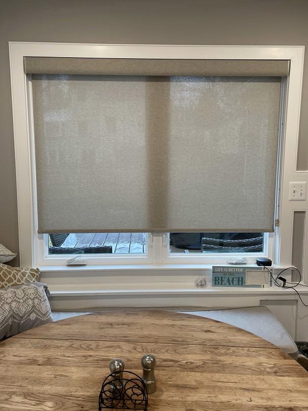 Don't let the harsh UV rays of the sunlight damage the beautiful wood furniture in your house. Check out how this gorgeous table is protected with our Solar Shades in this Alexandria house.