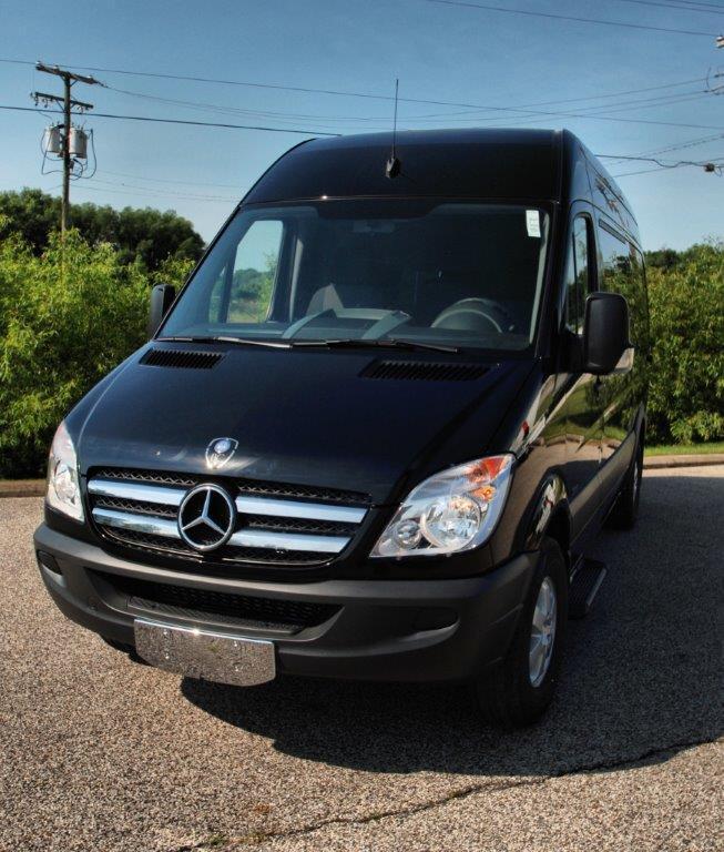 12 passenger Luxury Executive Sprinter with rear luggage compartment.