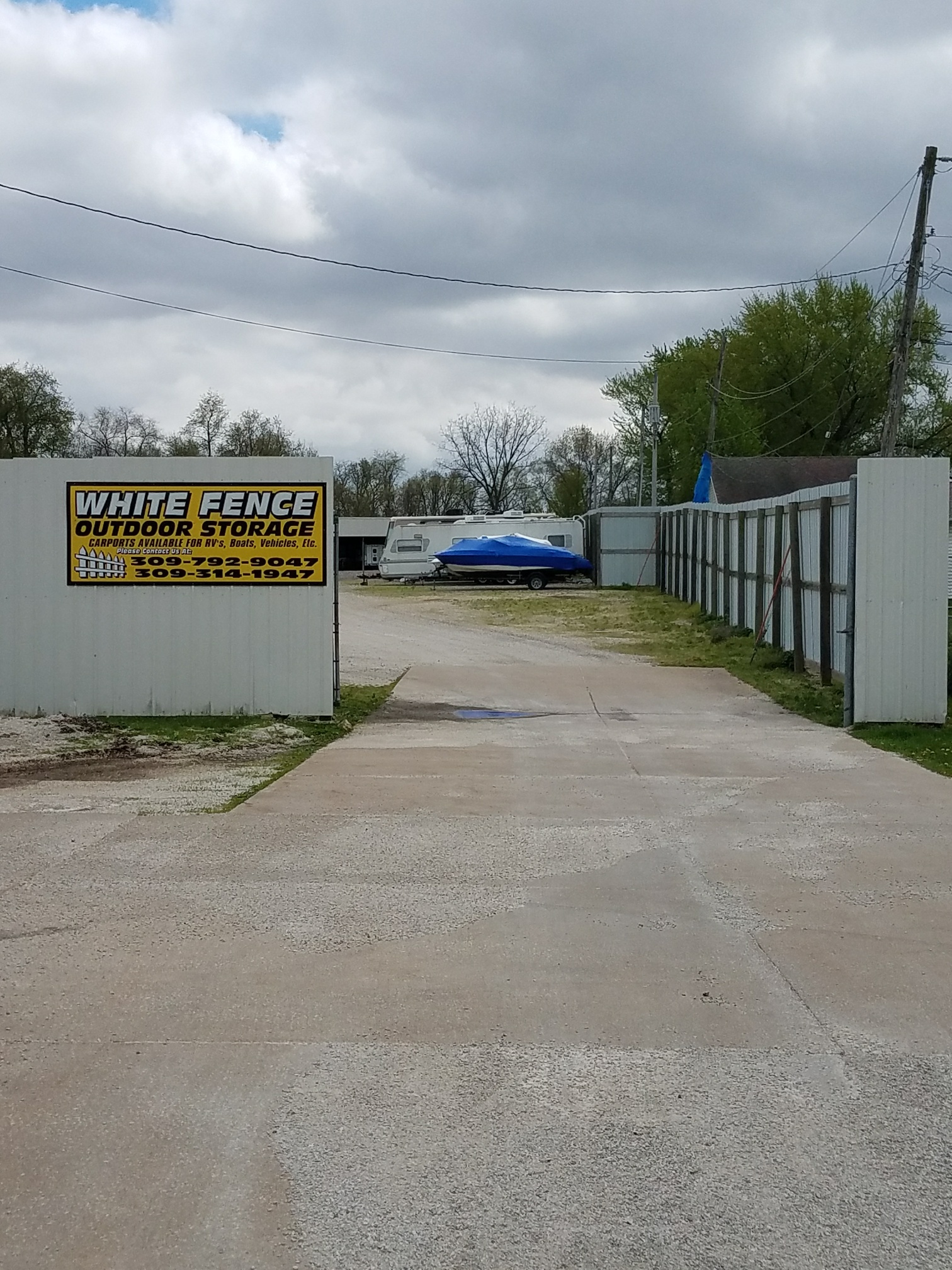 White Fence Outdoor Storage Photo