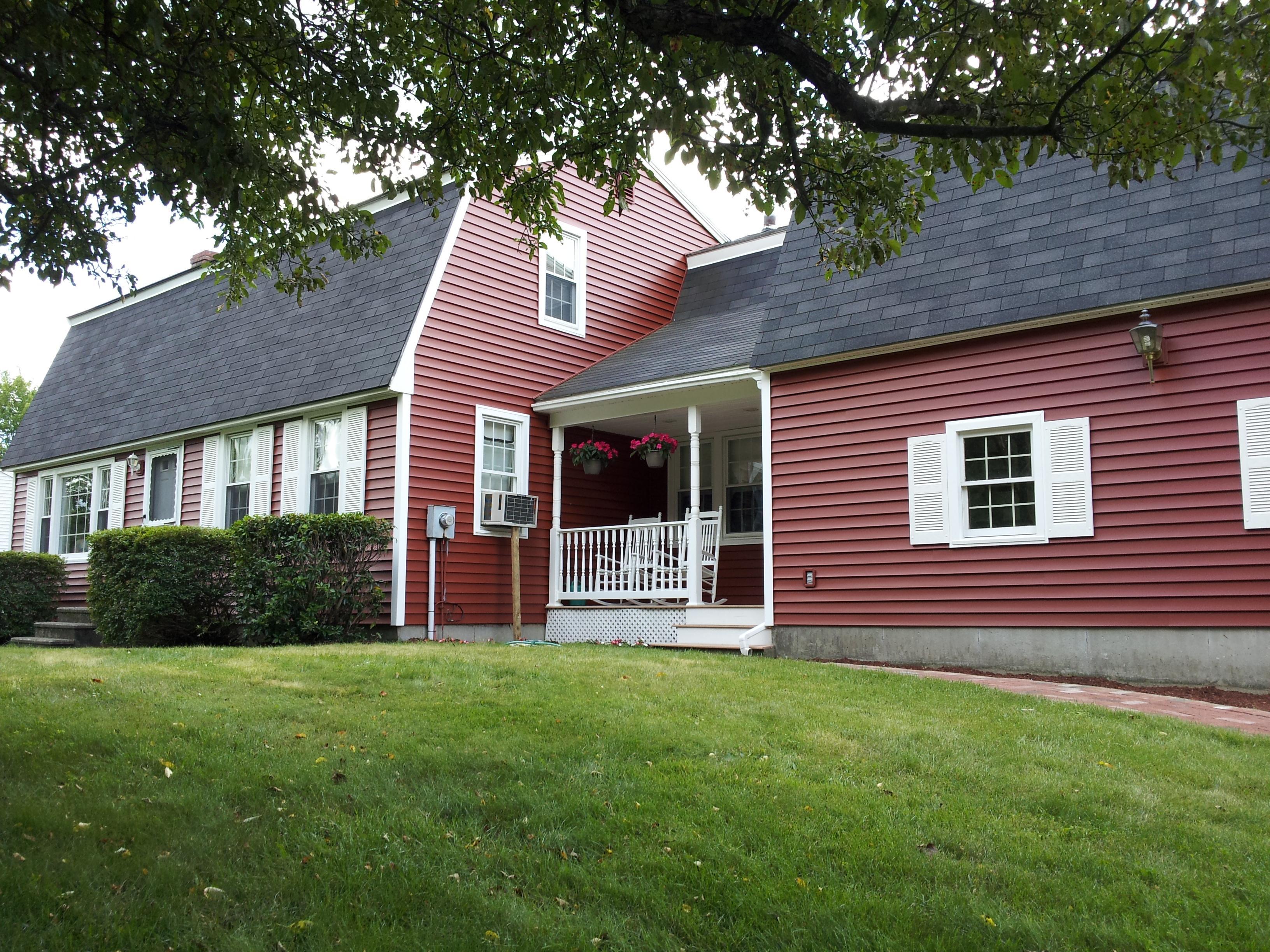 We used Alside Charter Oak vinyl siding  on this beautiful gambrel home in NH.