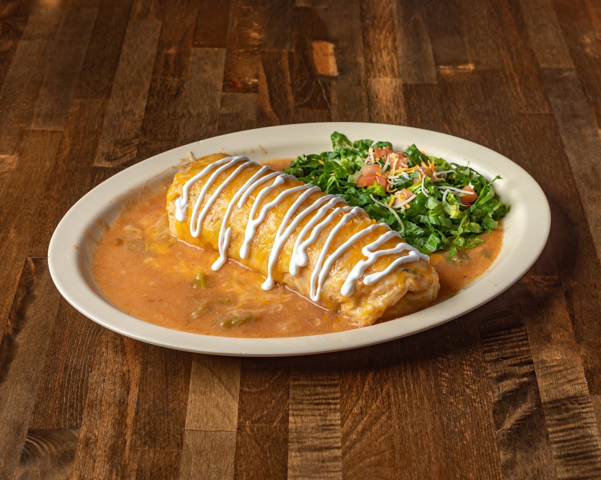 Smothered breakfast burrito