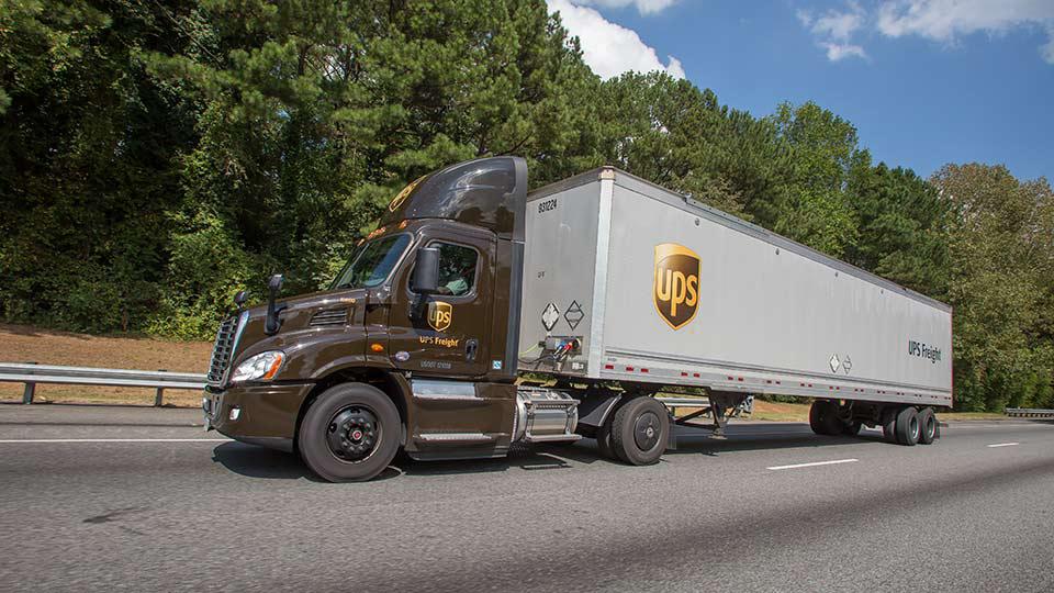 UPS freight truck driving through the mountains