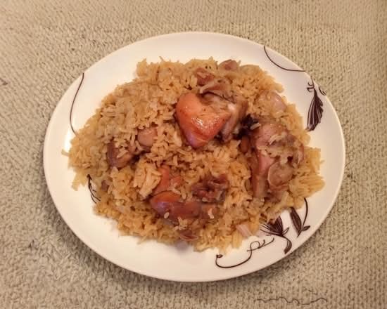 Locrio De Cerdo O Pollo / Mixed Rice with Pork or Chicken