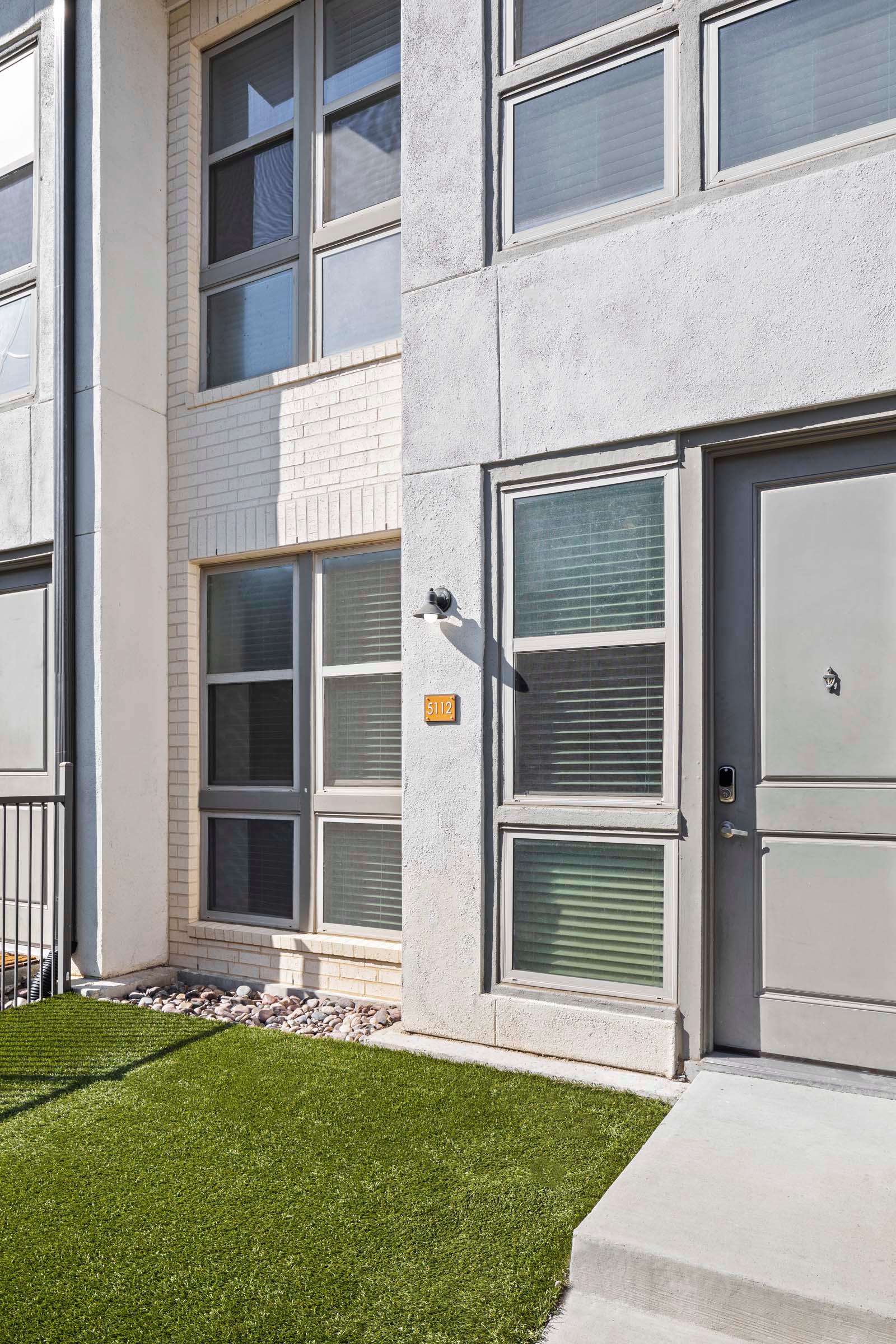 Villas Townhome front door entry with private yard at Camden Greenville