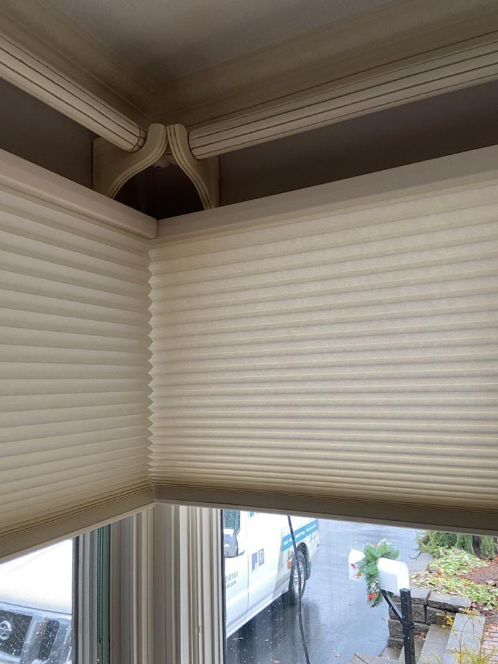 You don't always want to block the light completely with heavy drapes. That's why we installed Hunter Douglas Duette Shades in this Worcester home! They filter light beautifully!