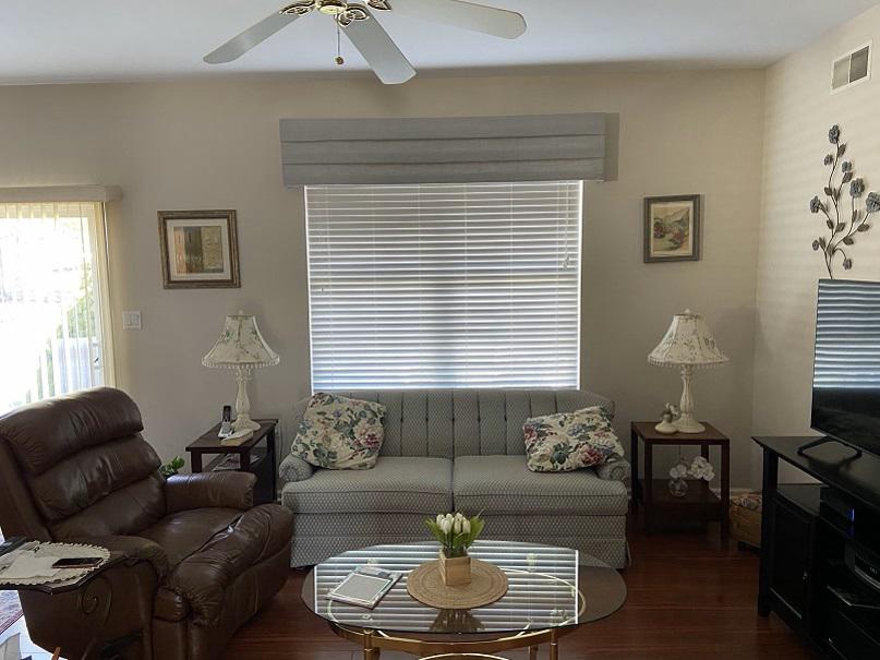 No one wants the blaring midday sun in their eyes while they're trying to watch TV. These Wood Blinds with a Fabric Wrapped Cornice are the perfect way to filter in just enough light to this Long Valley, NJ home.  BudgetBlindsPhillipsburg  WoodBlinds  BlindedByBeauty  FabricWrappedCornice  FreeConsu