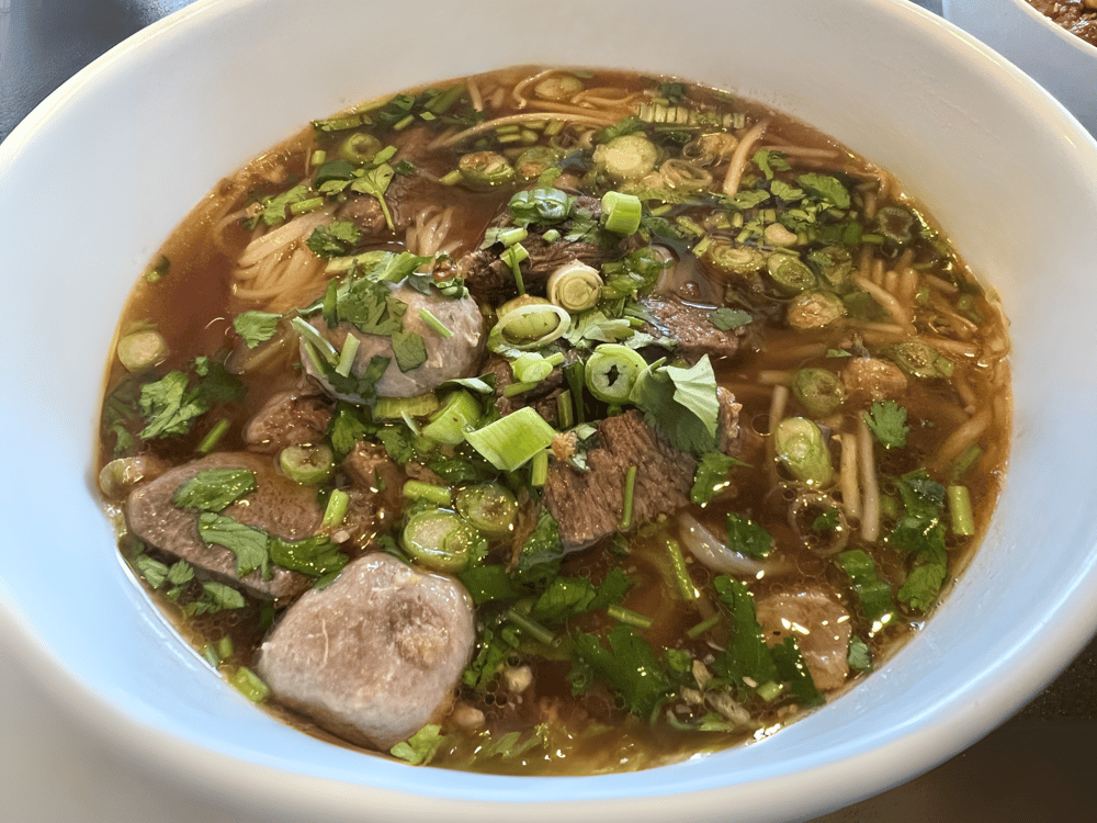 Thai Noodle Soup served with 1 Crispy Veg Roll