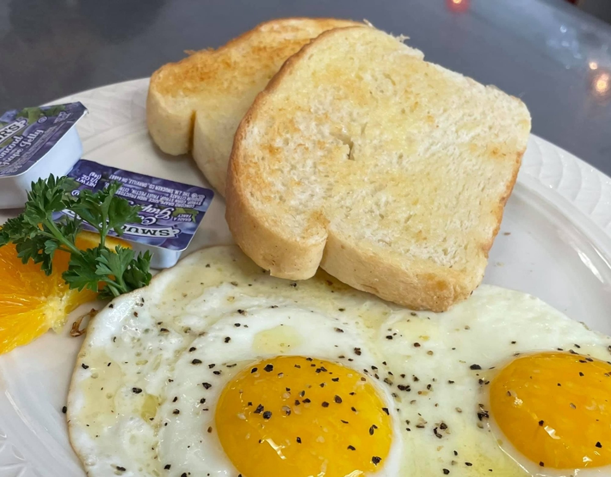 2 Eggs, Toast, Crispy Hashbrowns, W/ Bacon