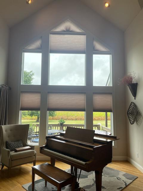 For these high transom windows in Mooresville, IN, Cellular Shades was the ideal choice as they are low maintenance and look gorgeous. Don't the shades look right at home with the grand piano?  BudgetBlindsPlainfield  MooresvilleIN  CellularShades  FreeConsultation