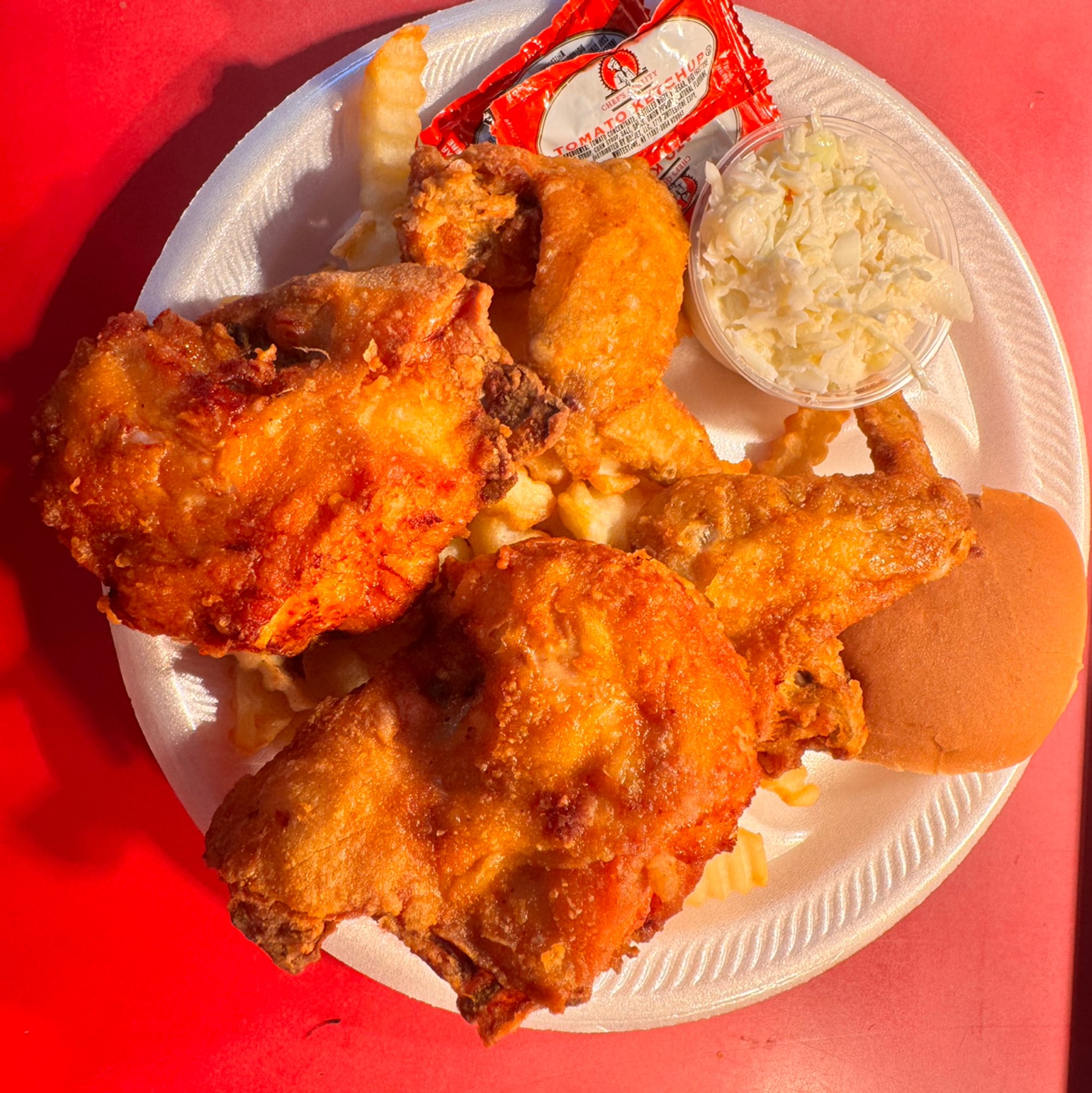 4 Pc 2 Breast, 2 Wings Dinner Includes Includes Fries, slaw & Roll