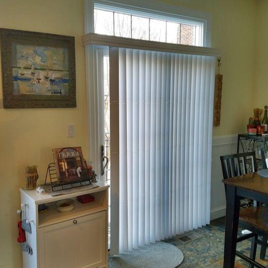 Covering glass doors is no longer an issue, thanks to Vertical Blinds by Budget Blinds of Arlington & Alexandria! They're the perfect stylish, sleek solution, offering glare control and privacy, while sliding neatly to the side for an outdoor view that is easily accessible when desired.  BudgetBlind