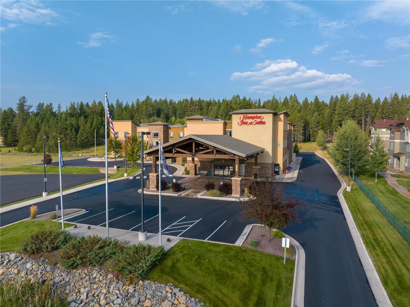 Hampton Inn &amp; Suites Whitefish Logo